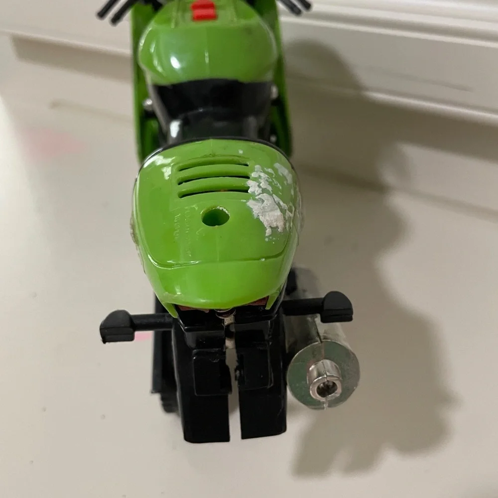 Ninja Green Kids Motorcycle Toy - wheel is missing side is broken